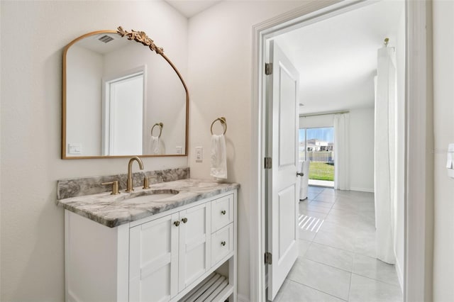 bathroom featuring vanity and tile patterned flooring