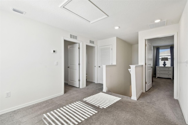 interior space with visible vents and baseboards