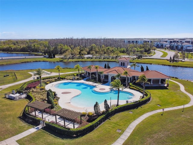 view of pool featuring a water view