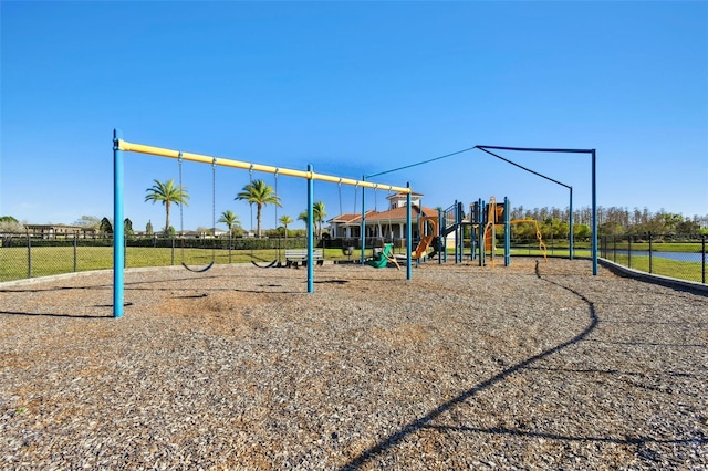 communal playground featuring fence