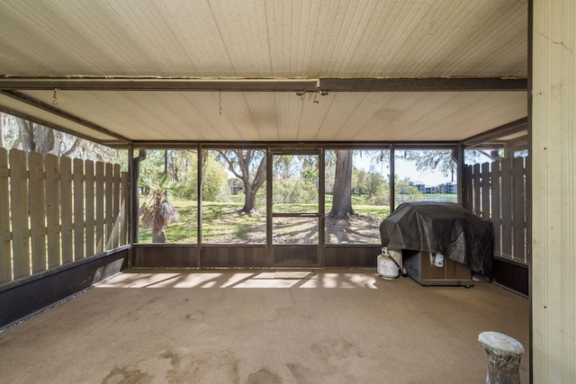 unfurnished sunroom with plenty of natural light