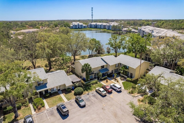 bird's eye view featuring a residential view and a water view