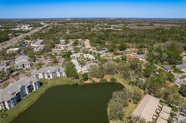 aerial view featuring a residential view and a water view