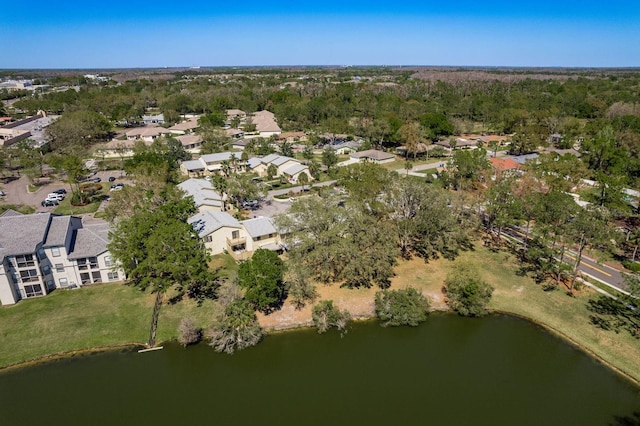 bird's eye view with a residential view and a water view