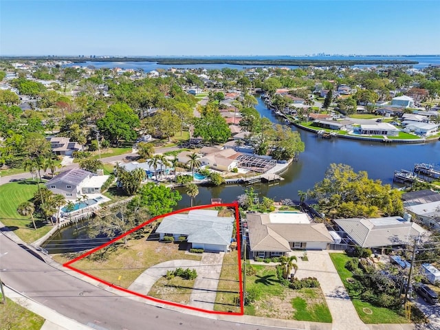 bird's eye view with a residential view and a water view