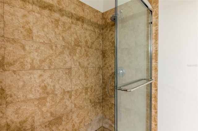 full bathroom with a shower stall