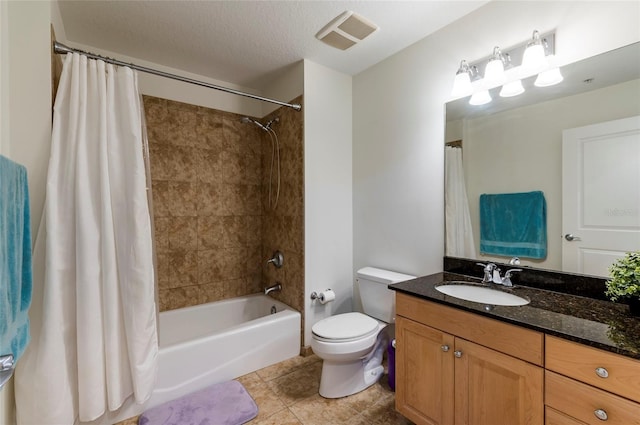 full bathroom with tile patterned floors, visible vents, toilet, shower / bath combo, and vanity