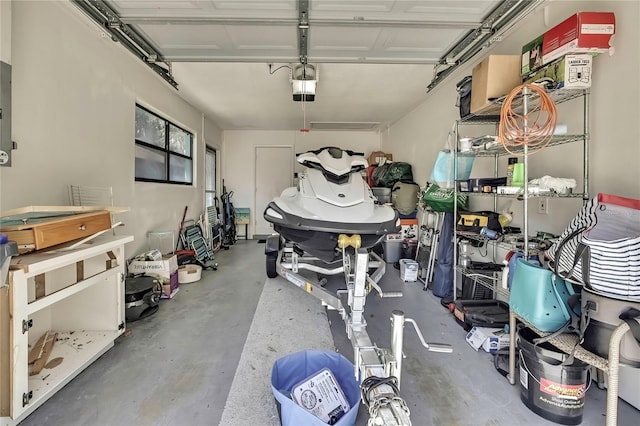 garage featuring a garage door opener