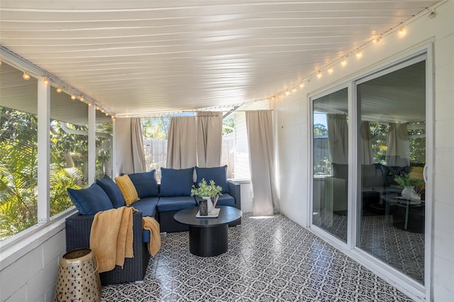 sunroom with track lighting