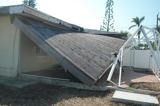 exterior details featuring fence