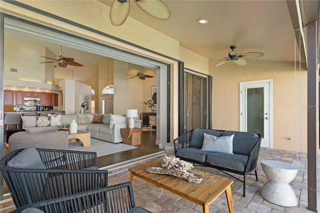 view of patio / terrace with visible vents, outdoor lounge area, and a ceiling fan