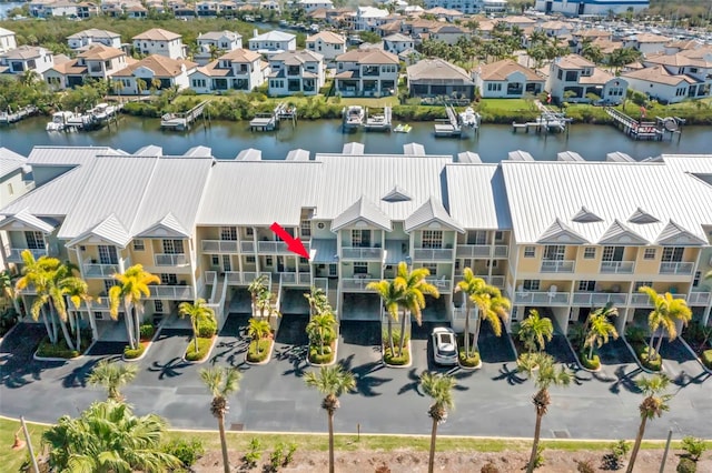 545 Bahia Beach Blvd, Ruskin, FL 33570 - drone / aerial view featuring a residential view and a water view