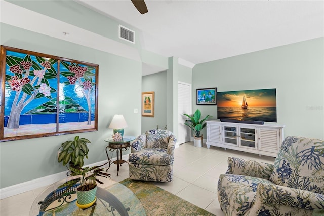 545 Bahia Beach Blvd, Ruskin, FL 33570 - living room featuring a ceiling fan, tile patterned floors, baseboards, and visible vents