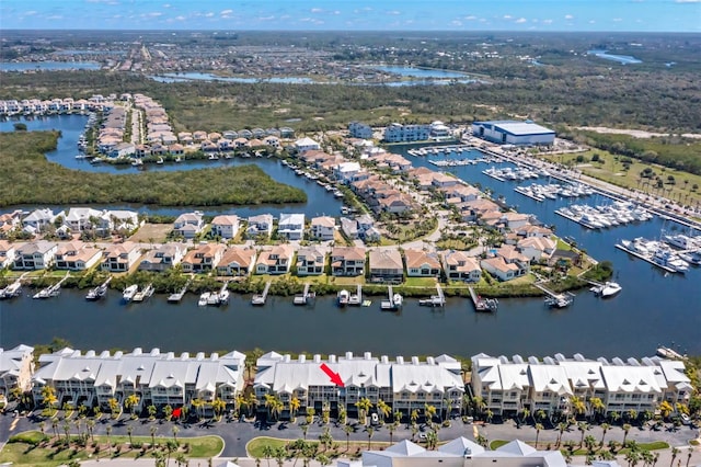 545 Bahia Beach Blvd, Ruskin, FL 33570 - birds eye view of property with a water view and a residential view