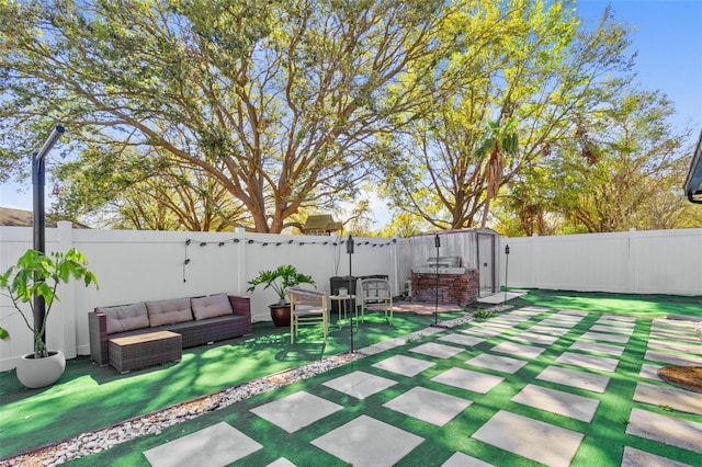 view of patio / terrace featuring a fenced backyard and an outdoor hangout area