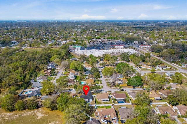 birds eye view of property with a residential view