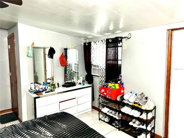 bedroom featuring light tile patterned floors