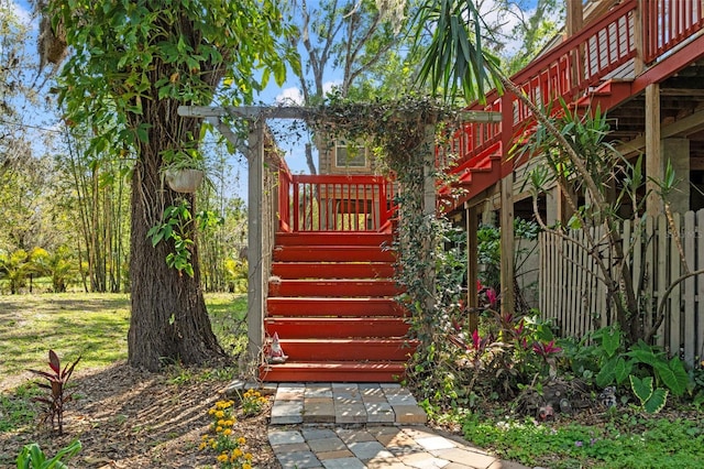 exterior space with a deck and stairway