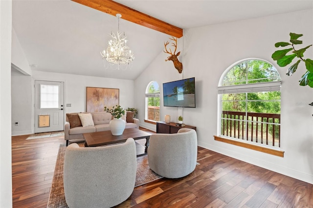 living area with lofted ceiling with beams, baseboards, a notable chandelier, and wood finished floors