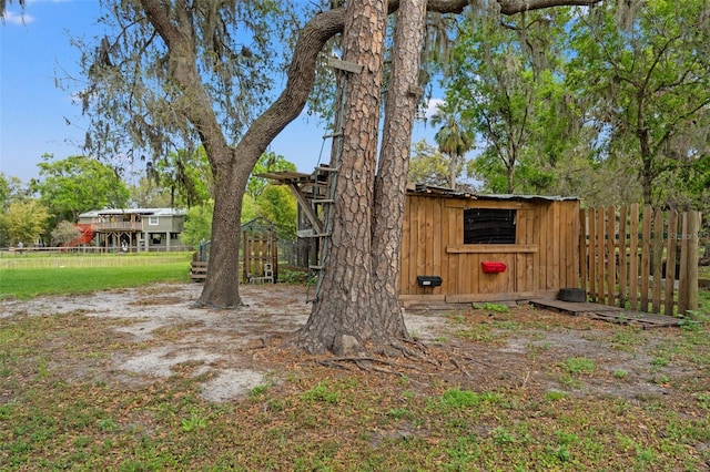 view of yard featuring fence