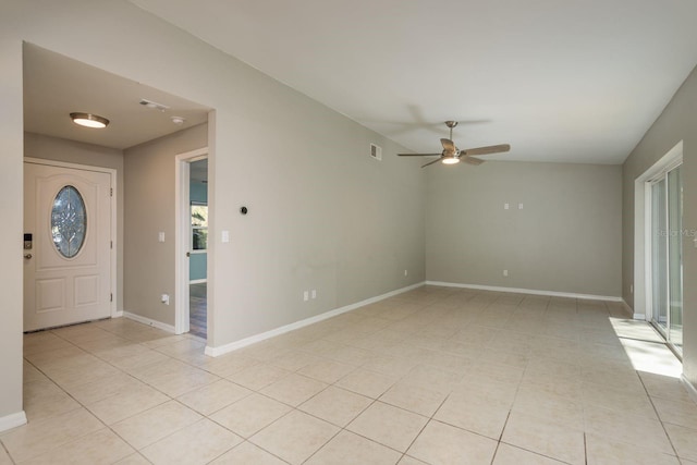 foyer entrance featuring visible vents, baseboards, light tile patterned flooring, and a ceiling fan