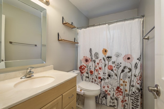 bathroom with tile patterned floors, toilet, a shower with shower curtain, and vanity