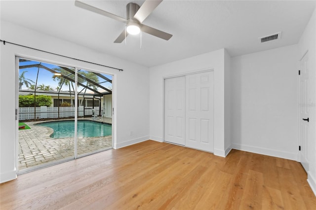 interior space with a ceiling fan