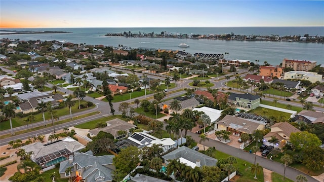 bird's eye view with a residential view and a water view