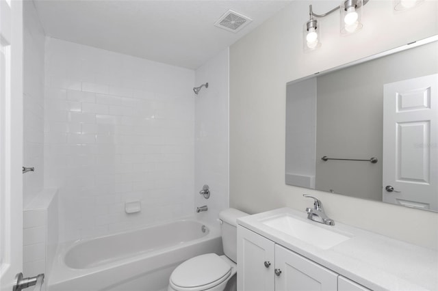 full bathroom featuring visible vents, shower / bathtub combination, toilet, and vanity