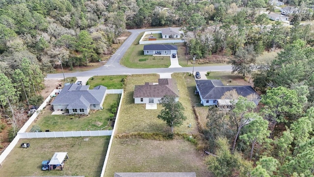 aerial view featuring a view of trees