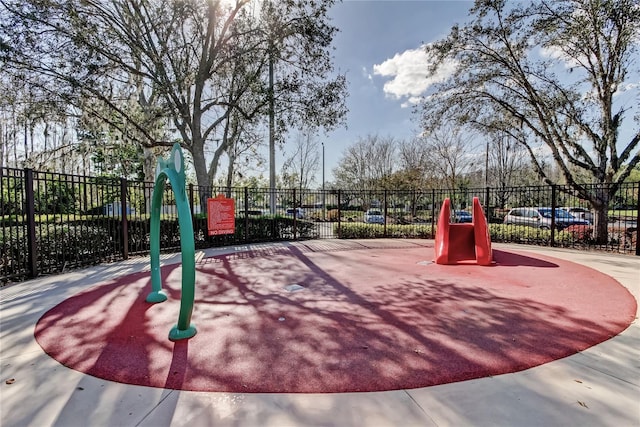 view of play area featuring fence