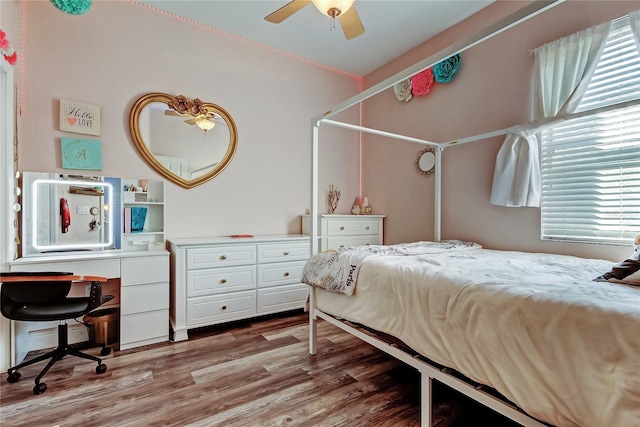 bedroom featuring wood finished floors