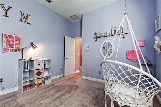 bedroom featuring carpet flooring, visible vents, and baseboards