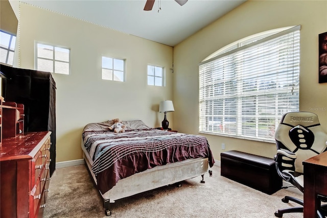 bedroom featuring baseboards, carpet, and a ceiling fan