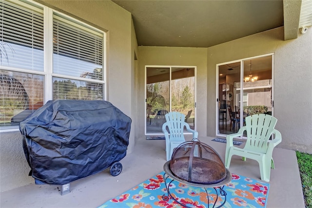 view of patio featuring a grill