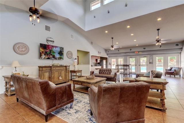 living area with recessed lighting, visible vents, light tile patterned flooring, and a ceiling fan