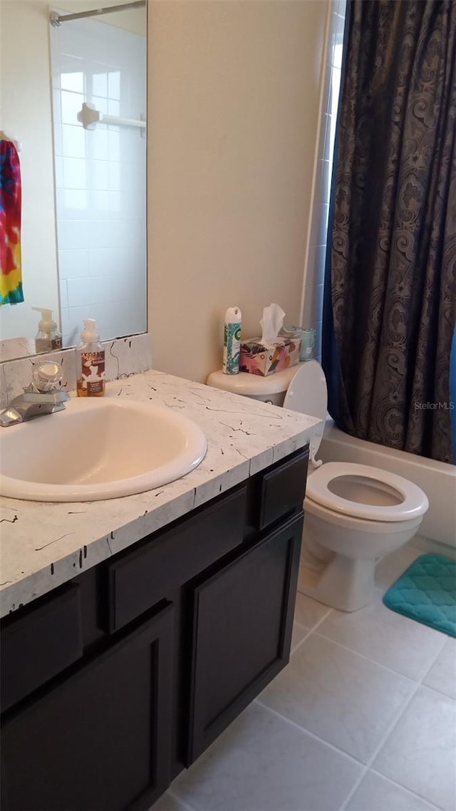 full bath with shower / bathtub combination with curtain, vanity, toilet, and tile patterned flooring