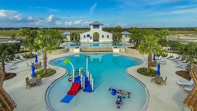 pool with a patio area