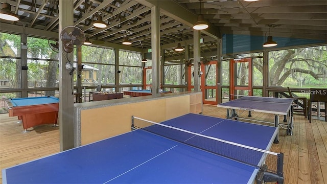 game room with wood-type flooring