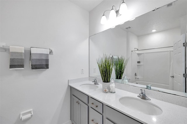 5728 Skytop Dr, Lithia, FL 33547 - full bath featuring double vanity and tub / shower combination