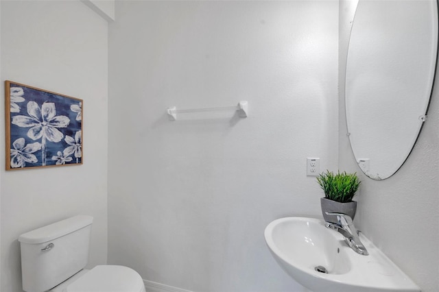5728 Skytop Dr, Lithia, FL 33547 - half bathroom featuring toilet and a sink