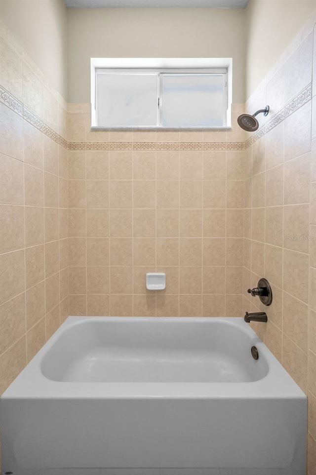 bathroom featuring bathing tub / shower combination