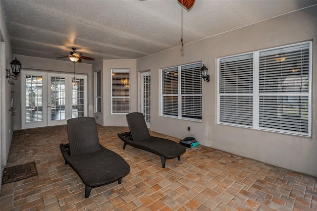 view of patio / terrace with french doors and ceiling fan