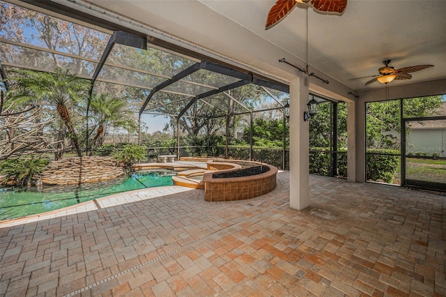 view of patio / terrace with glass enclosure, an in ground hot tub, an outdoor pool, and ceiling fan