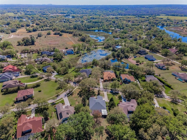 aerial view featuring a residential view and a water view