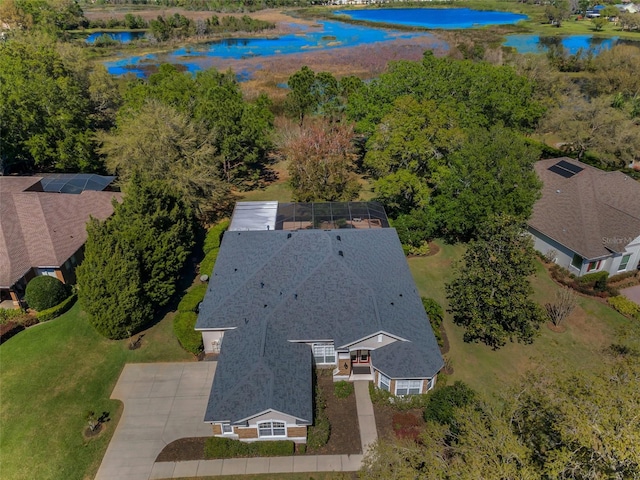 bird's eye view with a water view