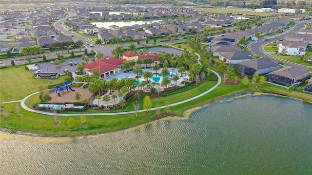 aerial view featuring a residential view and a water view