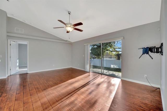 unfurnished room featuring visible vents, baseboards, ceiling fan, vaulted ceiling, and hardwood / wood-style floors