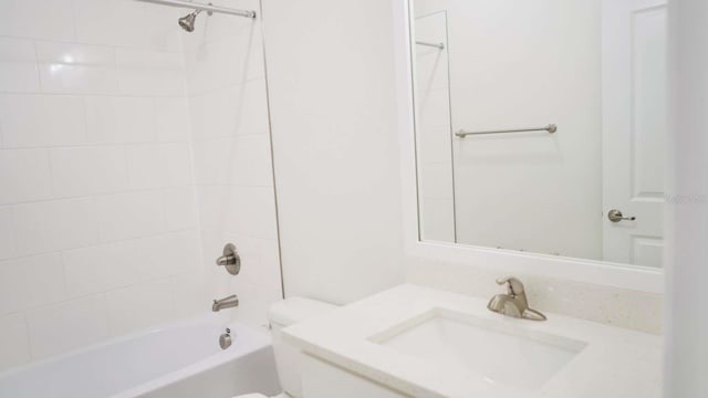 bathroom featuring vanity, toilet, and shower / bath combination