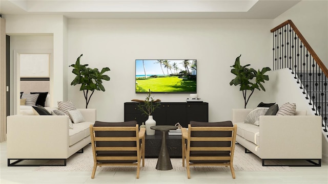 living room featuring stairway